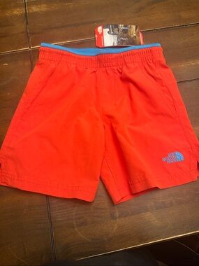 The North Face Red Shorts with Blue Accent (color looks orange but it's red)